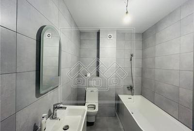 Apartament de vanzare in Sibiu - 3 camere, 2 bai, garaj, et 1-Turnisor - 20