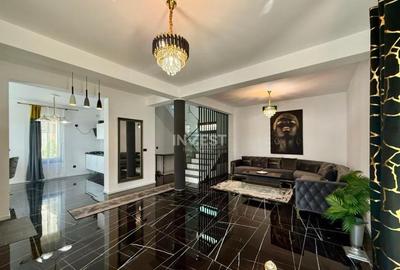Vila de vanzare cu design deosebit in cartierul Bucium