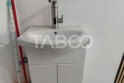 Garsoniera 11 mp renovata total in 2025 etaj 1 baie proprie Cisnadie - 8