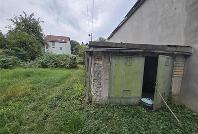 Imobil cu potential, constructie solida cu 2 apartamente,+demisol si garaj, Bras - 25