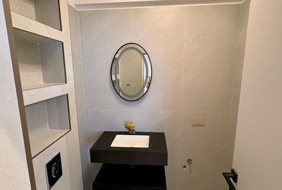 Penthouse cu 3 camere decomandat în Central - 12