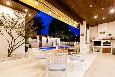 Arhitectura Distinsa: Casa Moderna Plan Parter si Piscina Privata - 2