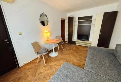 Garsonieră decomandată în Central - 9