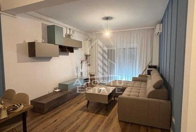 Apartament cu 2 camere semidecomandat, mobilat în Aradului