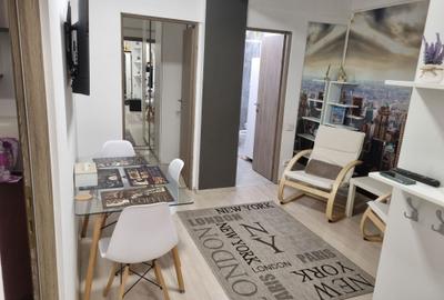 Apartament cu 3 camere semidecomandat, mobilat în Universitate