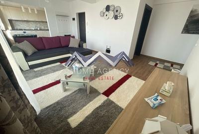 Apartament cu 3 camere semidecomandat, mobilat în Nord