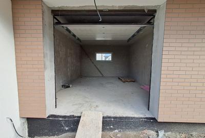 Casa cuplata prin garaj 23 mp, sup. totala 147 mp P+E in Chinteni - 3