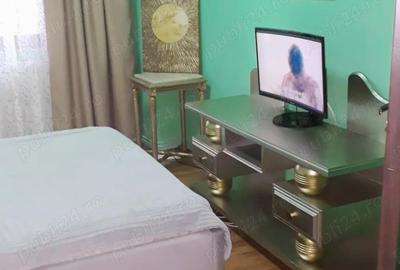 Apartament cu 4 camere decomandat în Găești - 10