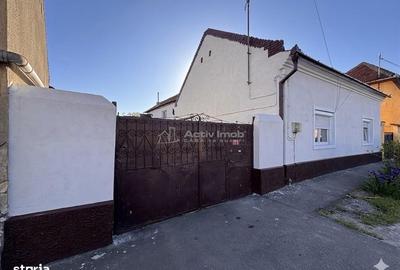 Casă cu 4 camere cu Teren 1200 Mp în Central