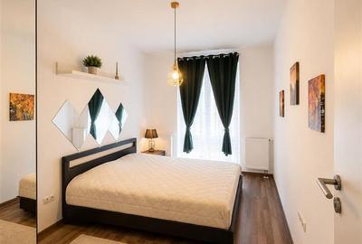 Apartament cu 2 camere decomandat, mobilat în Tractorul