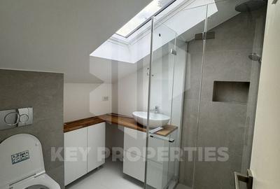 Piata Romana, mansarda boema, finisaje in linii simple si elegante - 8