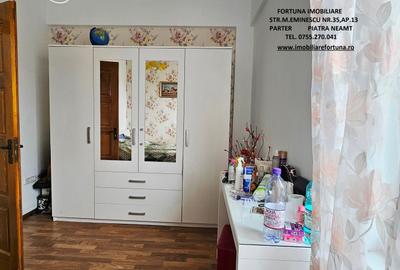 Locuinta individuala(apartament 4 camere)+spatiu comercial si teren ,Darmanesti - 12