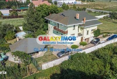 Casă cu 9 camere cu Teren 4200 Mp în Răzvad