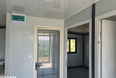 Casă cu 2 camere cu Teren 450 Mp în Tomești