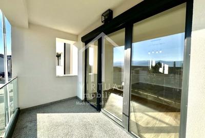 Ap. cu 3 camere  etaj intermediar  - 75mp utili + terasa - intabulat - 1