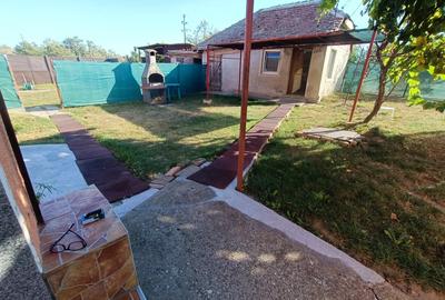 Vand casa caramida+ vaiuga + teren pentru casa in com. Livezile jud.Timi?. Doua CF - 2