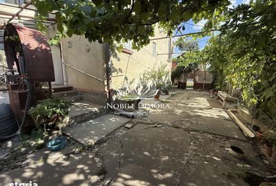 Casă cu 4 camere cu Teren 398 Mp în Central