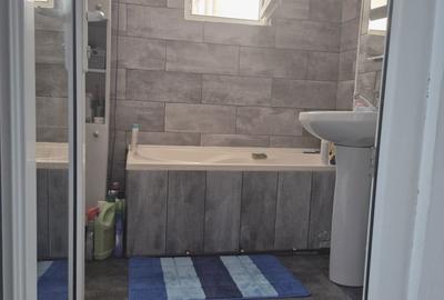 Apartament cu 3 camere decomandat în Costești - 6