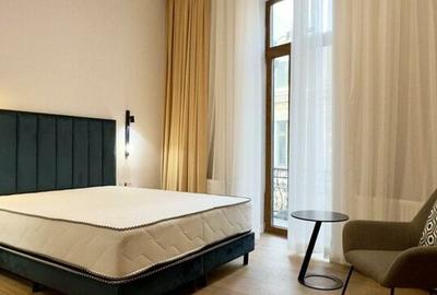 Magheru: 5 camere cu băi proprii - business regim hotelier care deja produce. - 2