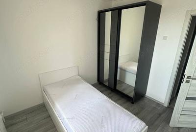Apartament cu 4 camere decomandat în Tractorul - 4