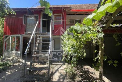 Casa cu etaj Ronat tren 750 mp