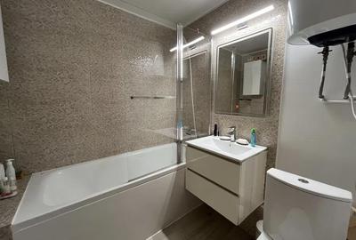 Apartament decomandat, mobilat în Costin Georgian