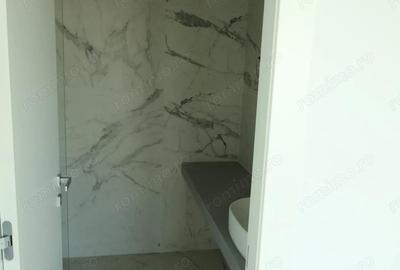 Casă cu 4 camere cu Teren 214 Mp în Tunari