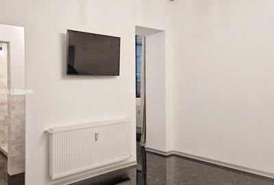 Apartament cu 4 camere decomandat, mobilat în P-ța Romană - 18