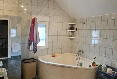 Ciorogarla-casa Sp+ P+M, garaj 2 loc+pod locuibil si casa oaspeti, teren=1097mp - 12