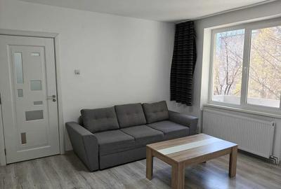 Apartament cu 2 camere decomandat în Tractorul