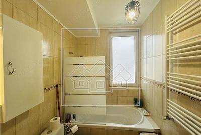 Casa cu 82 mp utili, gradina de 30 mp, Calea Cisnadiei - 10