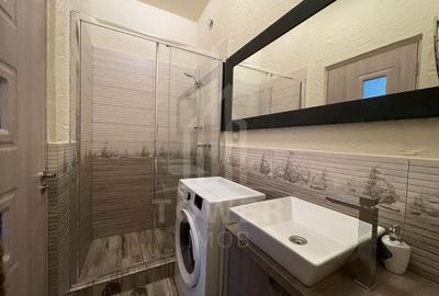 Garsonieră decomandată în Central - 9