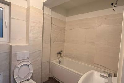 Apartament cu 2 camere decomandat în Bucium - 4