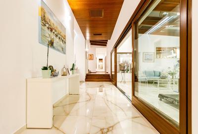 Arhitectura Distinsa: Casa Moderna Plan Parter si Piscina Privata - 10