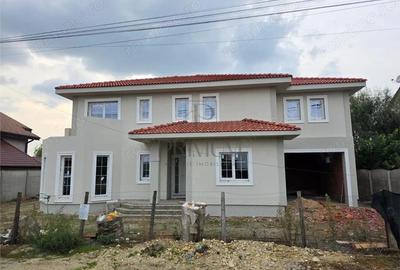 Casa individuala superba - teren 730 mp - garaj - 5 dormitoare - living 57mp. - 3