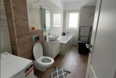 Apartament cu 3 camere decomandat în Tractorul