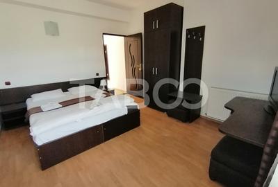 Pensiune 13 camere 16 bai sauna piscina si teren 1565 mp Cisnadioara - 34