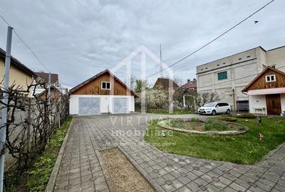 Casa individuala cu 6 camere + demisol 94mp utili, teren 972mp, garaje - 2