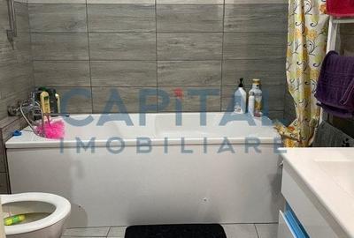 Constructie cu 3 apartamente + teren+ 2 spatii comerciale - 9