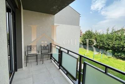 Apartament in vila, dispunere pe 3 niveluri. Gradina proprie. Terasa de 31 mp. - 14