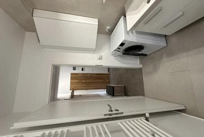 Garsonieră decomandată în Central - 9