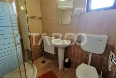 Pensiune 13 camere 16 bai sauna piscina si teren 1565 mp Cisnadioara - 11