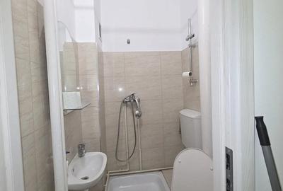 Garsonieră decomandată în Central - 7