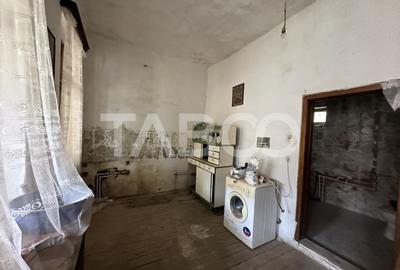 Casa cu potential de investitie in centrul satului 1540 mp teren - 11