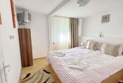 Casă cu 12 camere în Moieciu