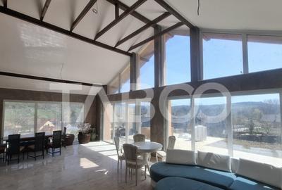 Casa de vanzare 405 mp utili 2 garaje 250 mp terase Slimnic - 2