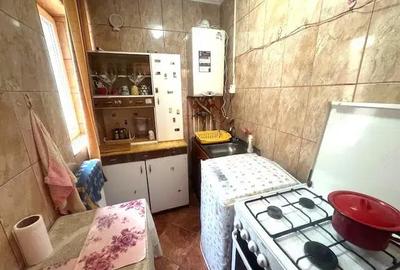 Apartament cu 4 camere decomandat în Drăgănești-Olt - 12
