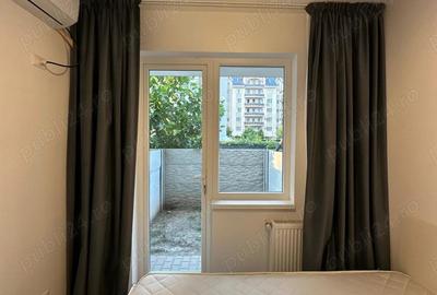 Garsoniera cu Curte Proprie Str. Biruin?ei 2 camere - 10