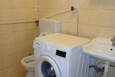 Garsonieră decomandată în Central - 7