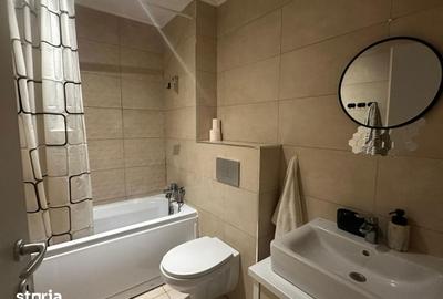 Apartament cu 2 camere decomandat în Ștefăneștii de Jos - 4